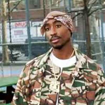 2pac in a camo bandana