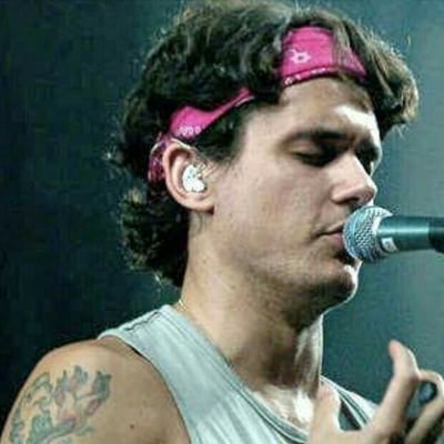John Mayer in a pink bandana