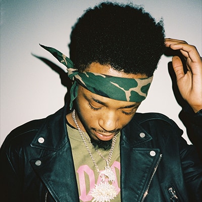 Metro Boomin in a camo bandana